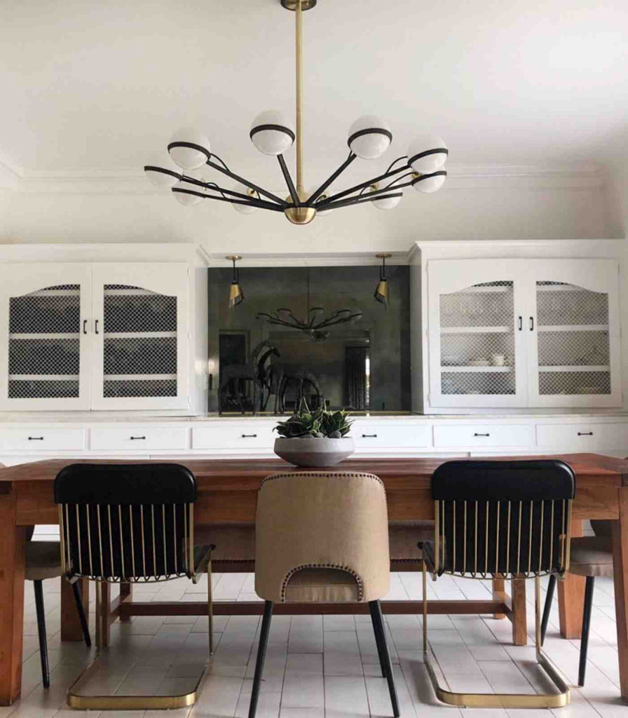 Hudson Valley Ace Pendant Light hanging over dining table