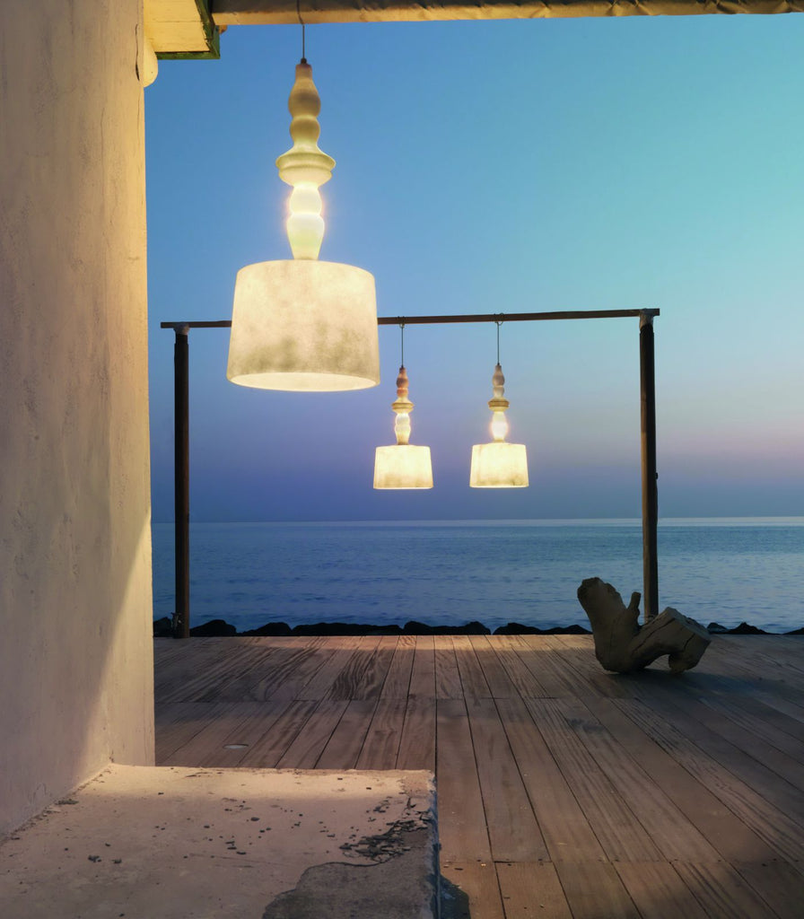 Karman Alibabig Outdoor Pendant Light featured within a outdoor space