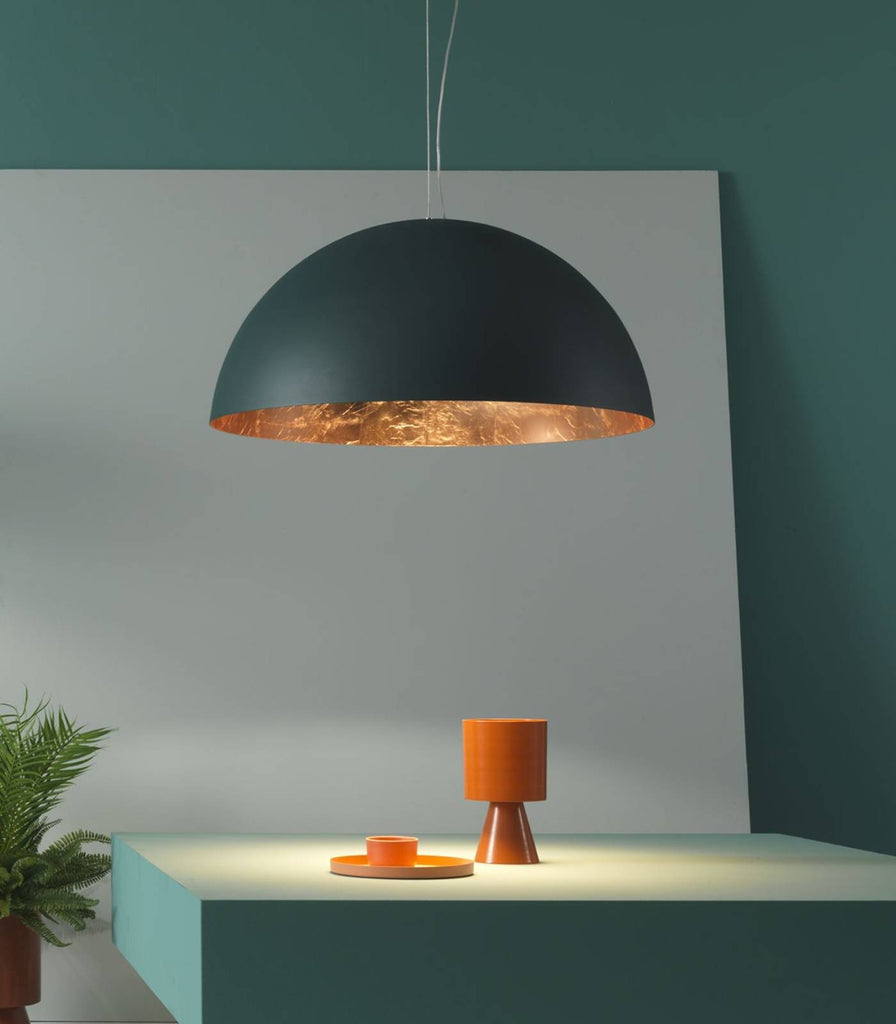 Amedeo Pendant Light by Zava hung over a table