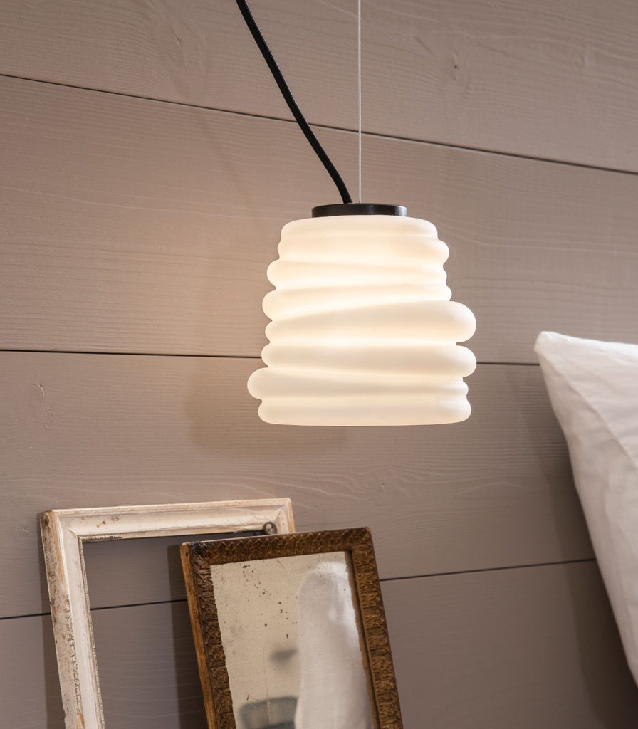 Karman Bibendum White Pendant Light featured within a interior space