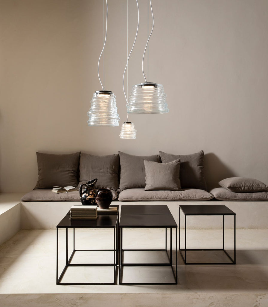 Karman Bibendum Clear Pendant Light hanging in Living room