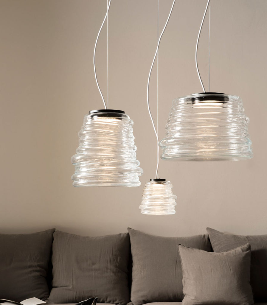 Karman Bibendum Clear Pendant Light hanging in Living room 