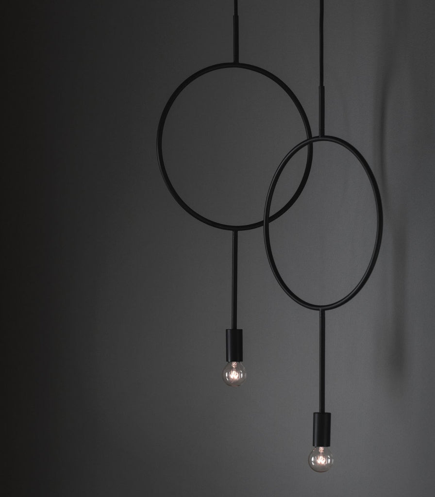 Norther Circle Pendant Light featured within a interior space