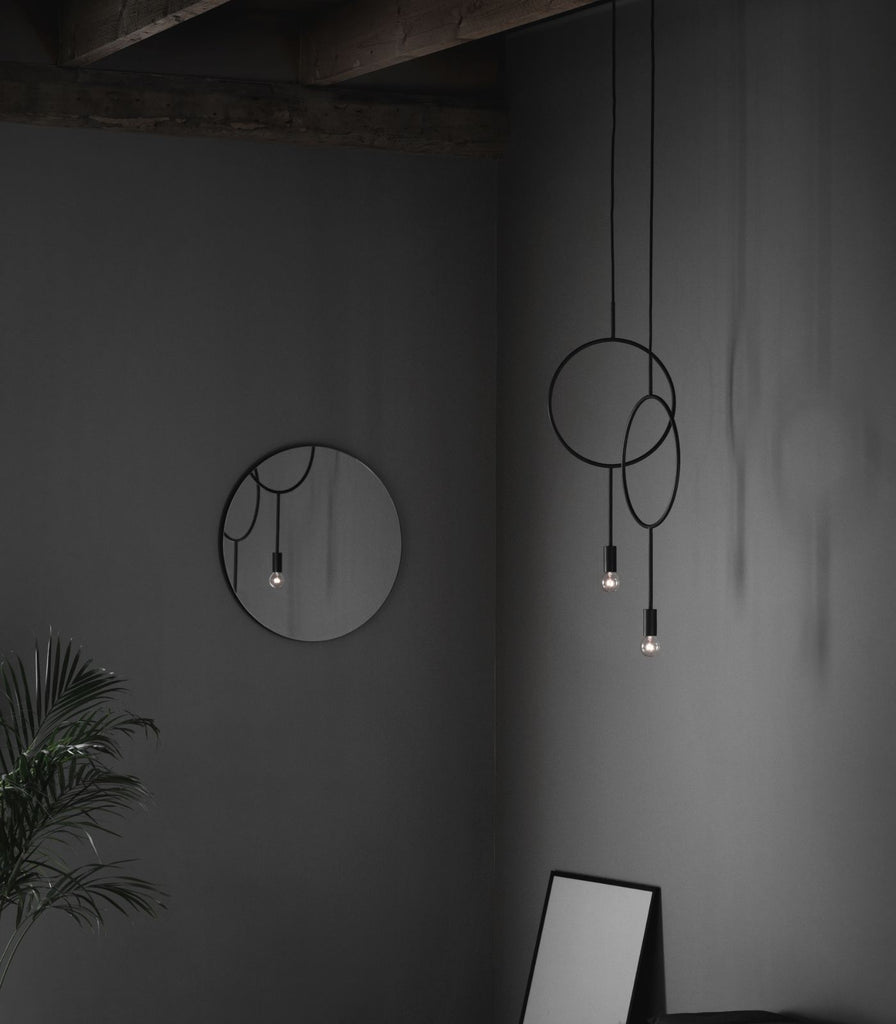 Norther Circle Pendant Light featured within a interior space
