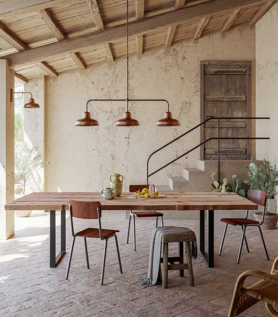 Il Fanale Contrada Pendant Light hanging over dining table