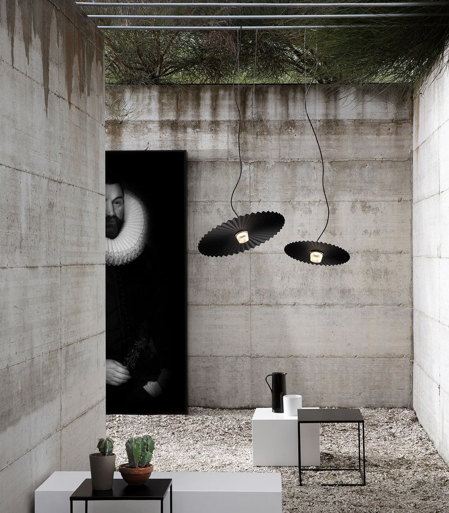 Karman Gonzaga Pendant Light featured within a interior space
