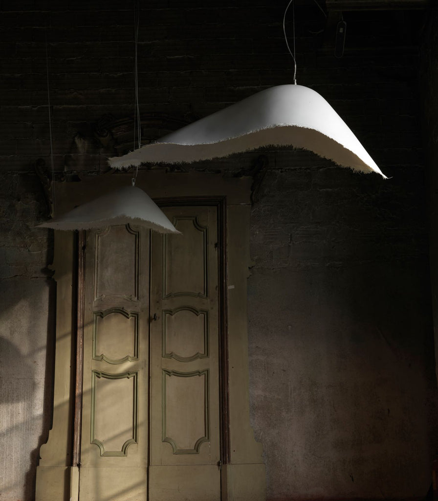 Karman Moby Dick Pendant Light featured within a interior space