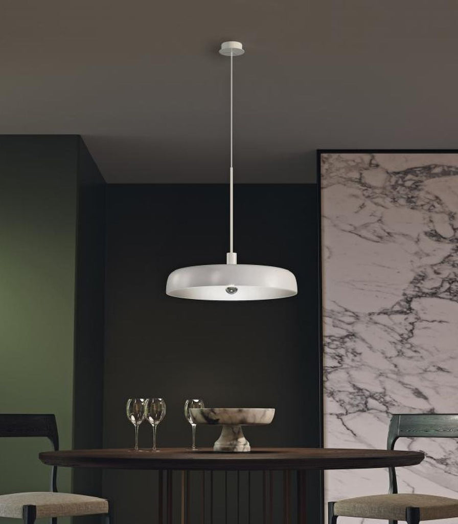 Oty MoMa Mono Pendant Light hanging over dining table