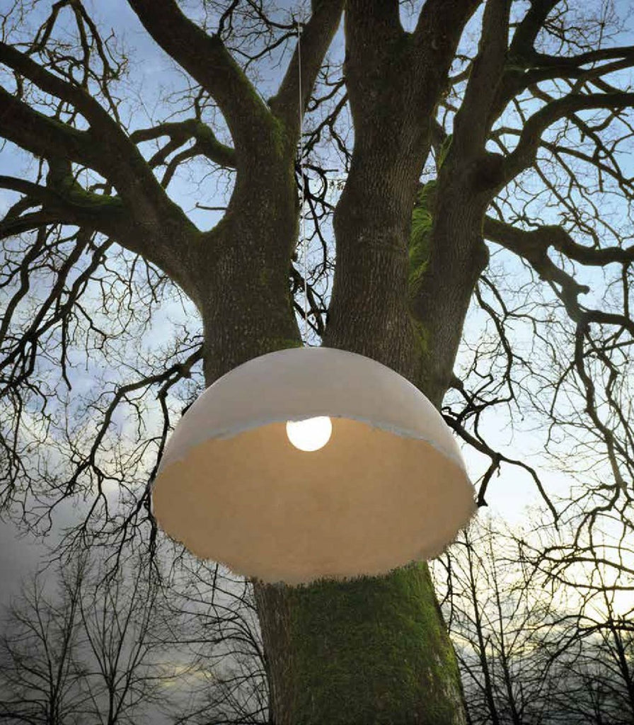 Karman Plancton Outdoor Pendant Light featured within a outdoor space