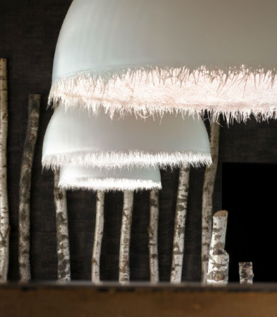 Karman Plancton Outdoor Pendant Light featured within a outdoor space