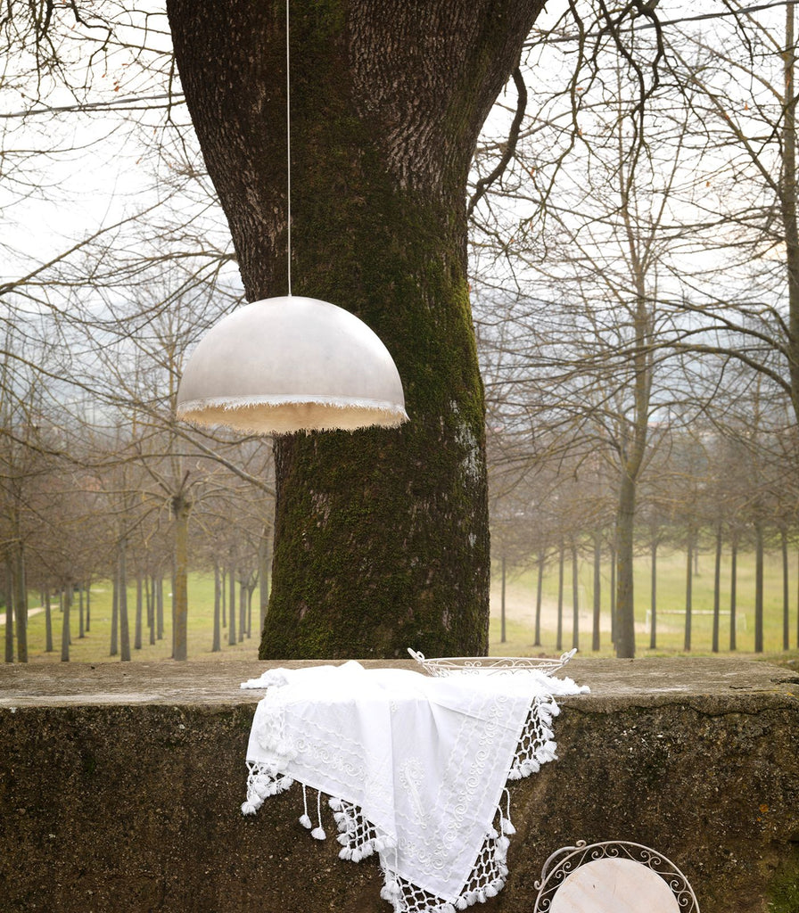 Karman Plancton Outdoor Pendant Light featured within a outdoor space