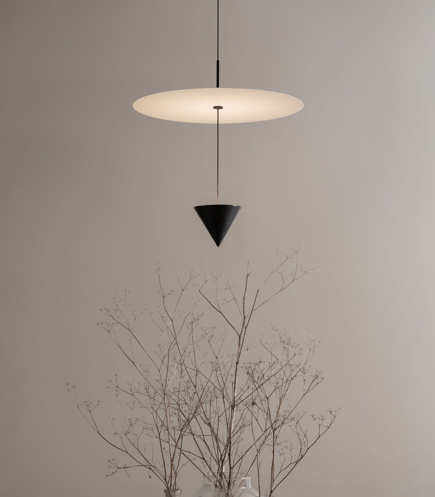 Karman Stralunata Pendant Light featured within a interior space