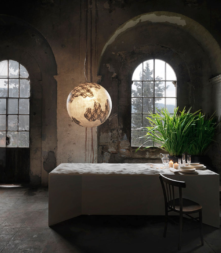 Karman Ululi Ulula Pendant Light featured within a interior space