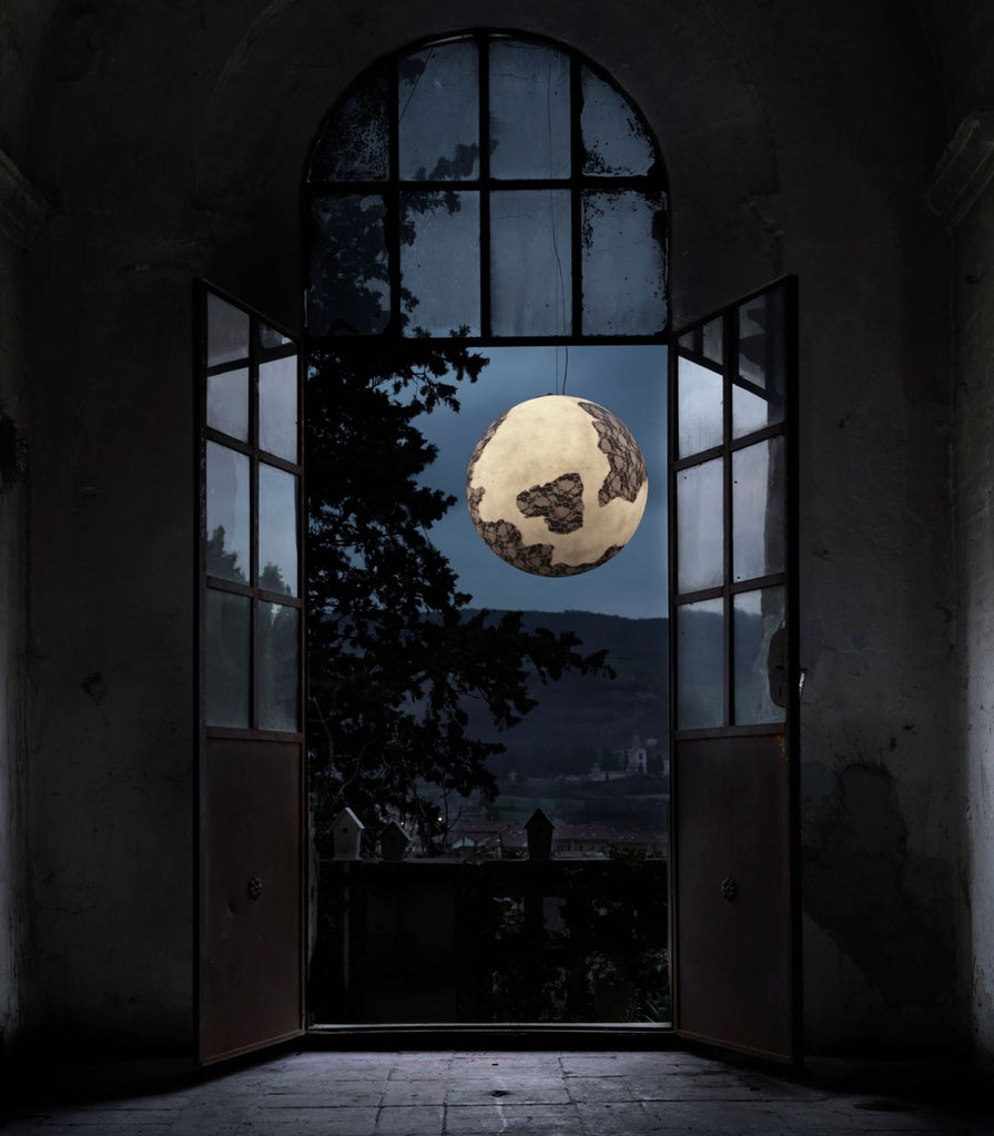 Karman Ululi Ulula Pendant Light featured within a interior space