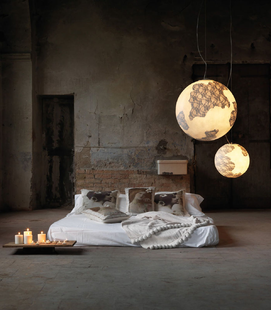 Karman Ululi Ulula Pendant Light featured within a interior space