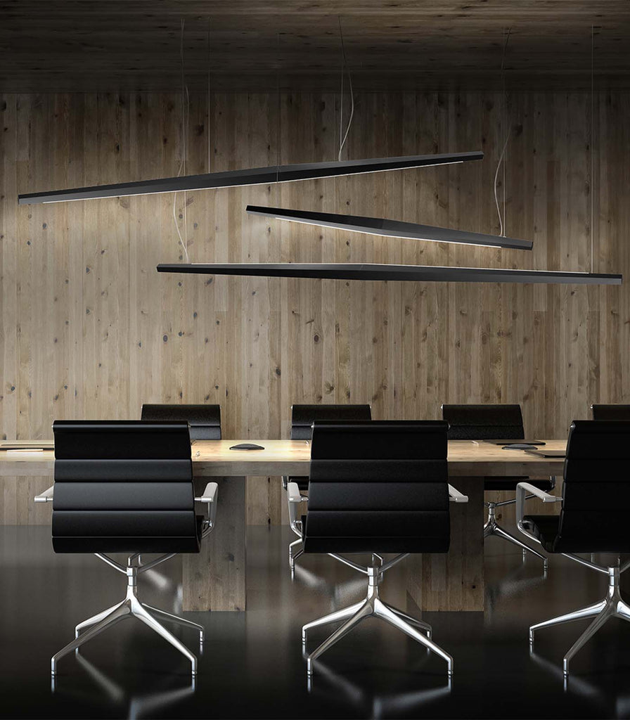 Panzeri Viisi Direct Pendant Light hanging over dining table