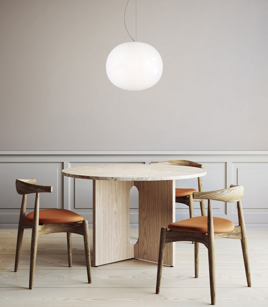 Lodes Volum Pendant Light hanging over dining table