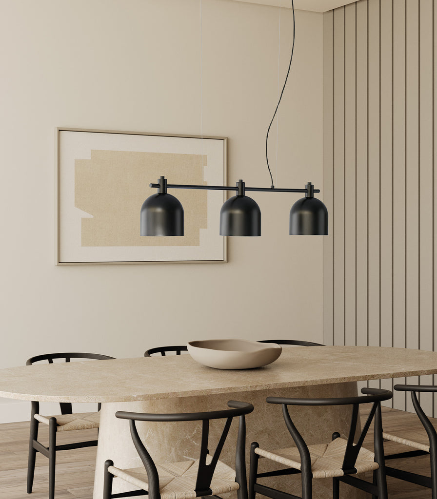 Aromas Luca 3lt Pendant Light hanging over dining table