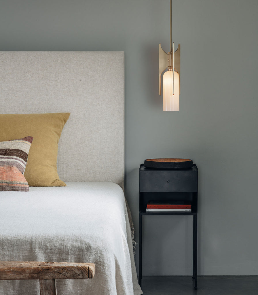 Bert Frank Pennon Pendant Light hanging over bedside table