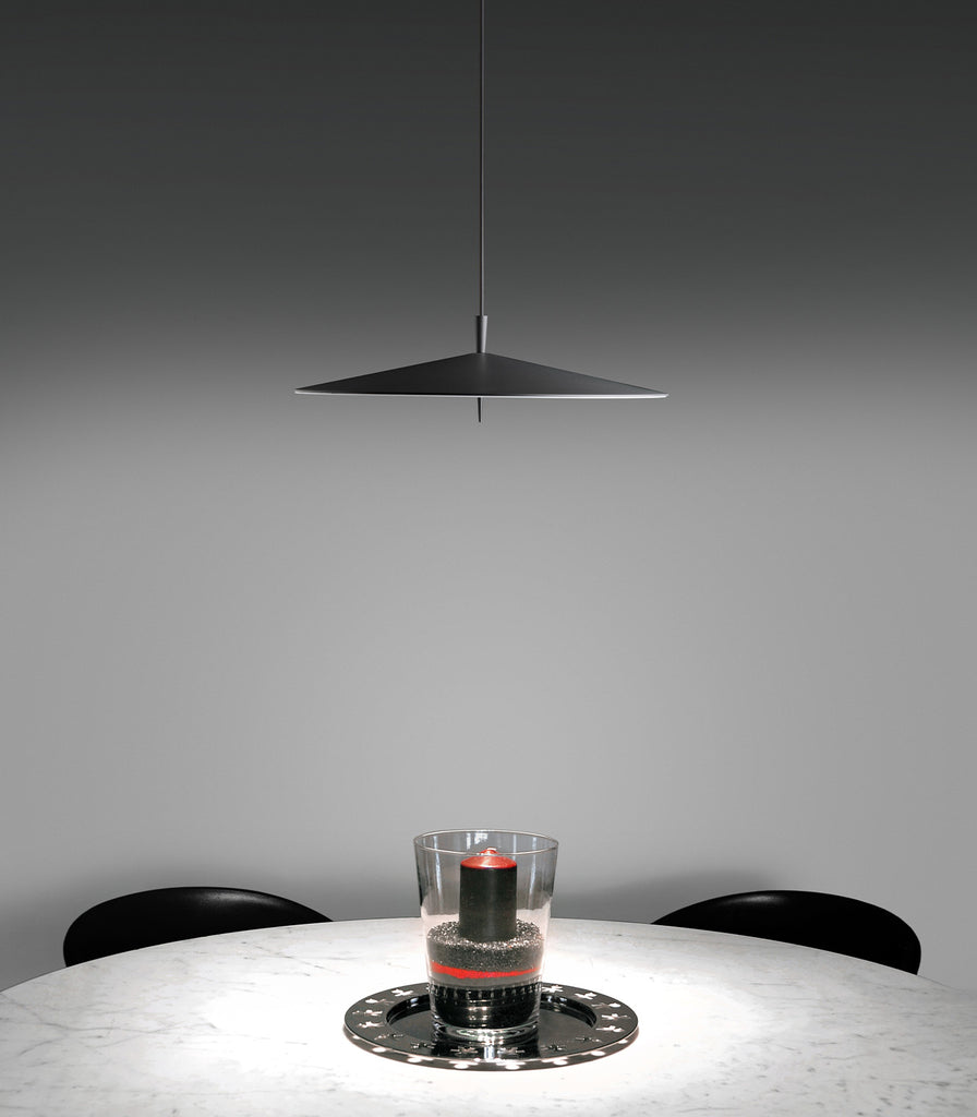Milan Pla Pendant Light hanging over dning table