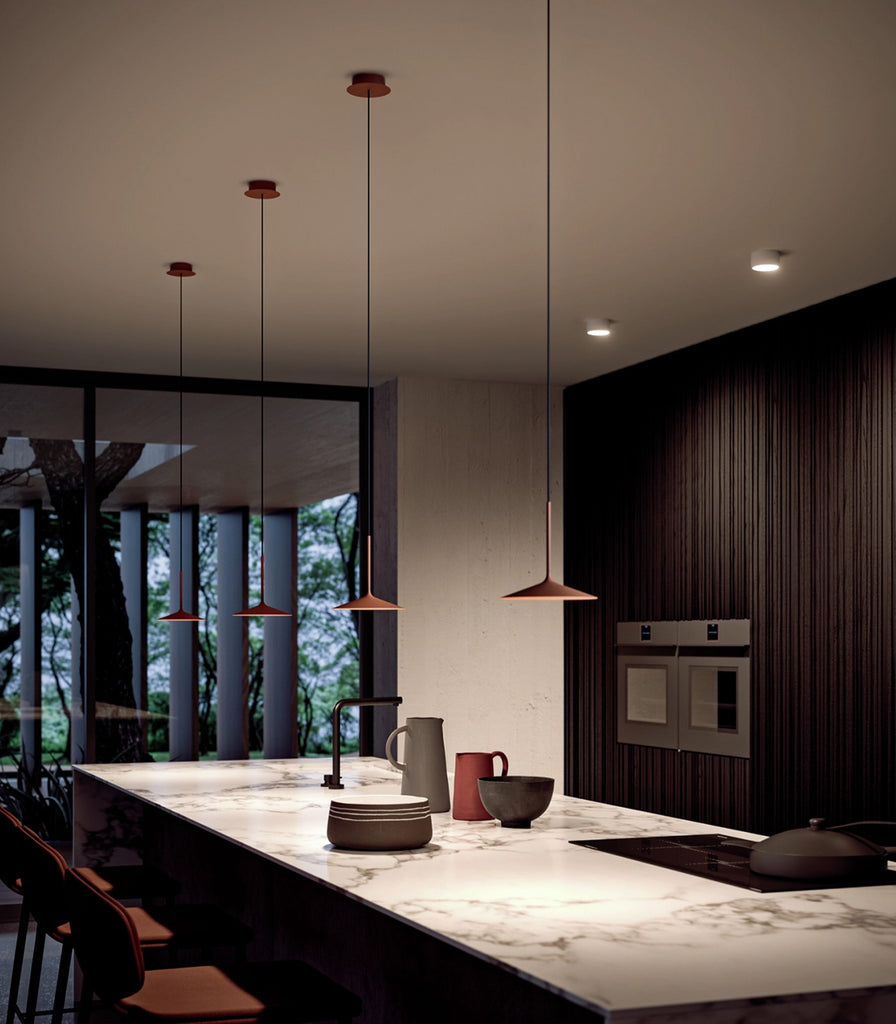 Linea Light Poe Pendant Light hanging over kitchen bench