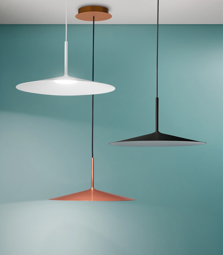 Linea Light Poe Plus Pendant Light featured within interior space