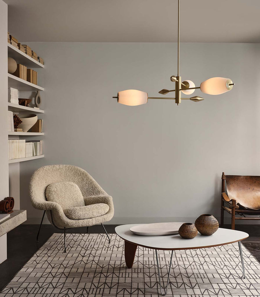 J. Adams & Co. Supernova 3lt Pendant Light hanging in a living room