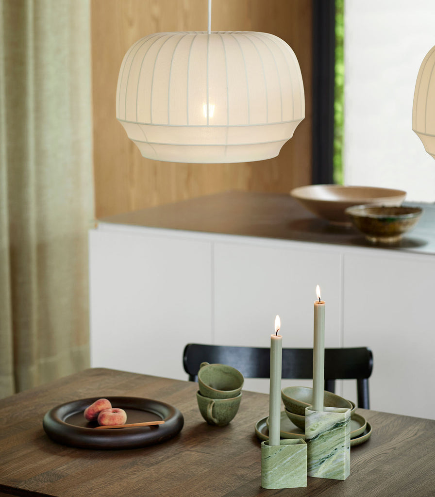 Northern Tradition Pendant Light hanging over dining table