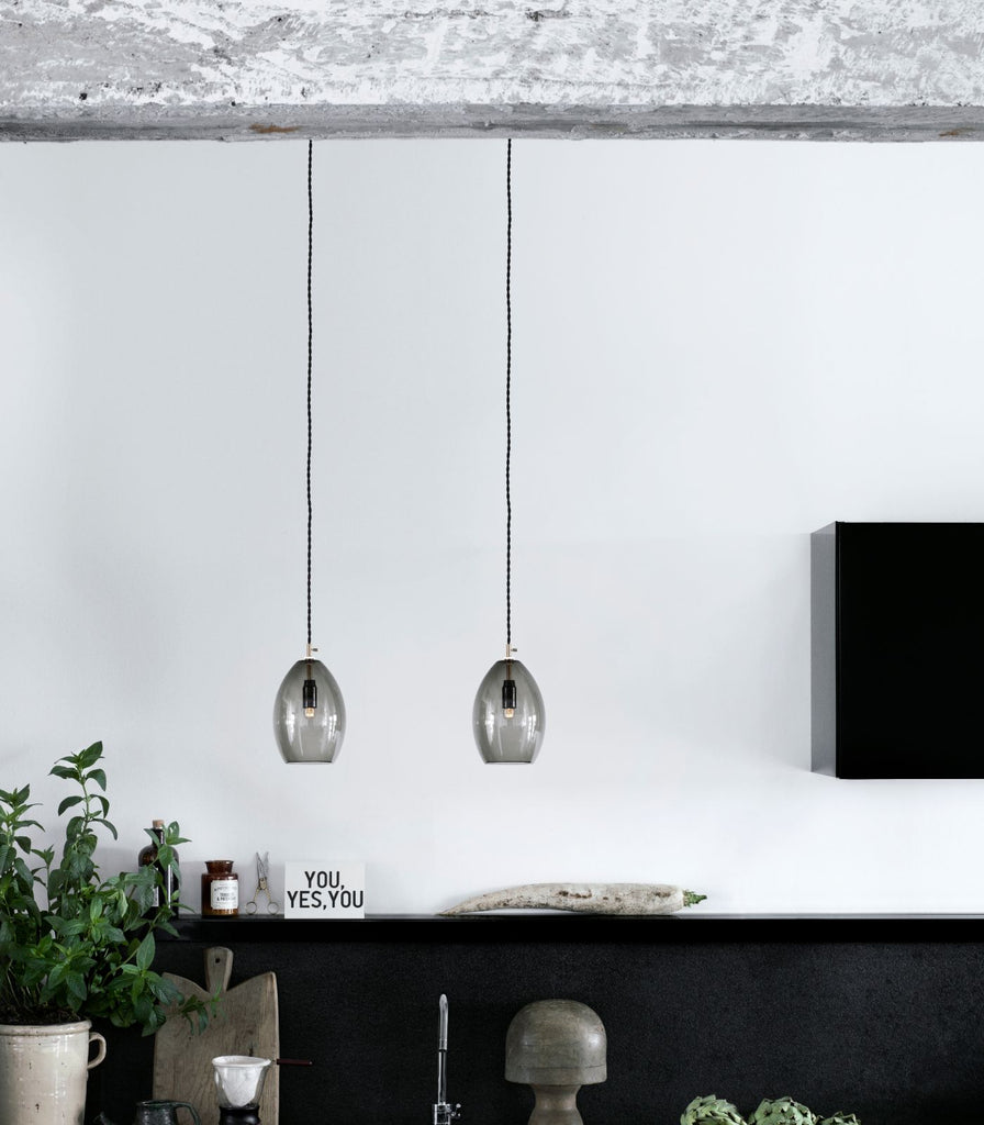 Northern Unika Small Pendant Light featured within a interior space