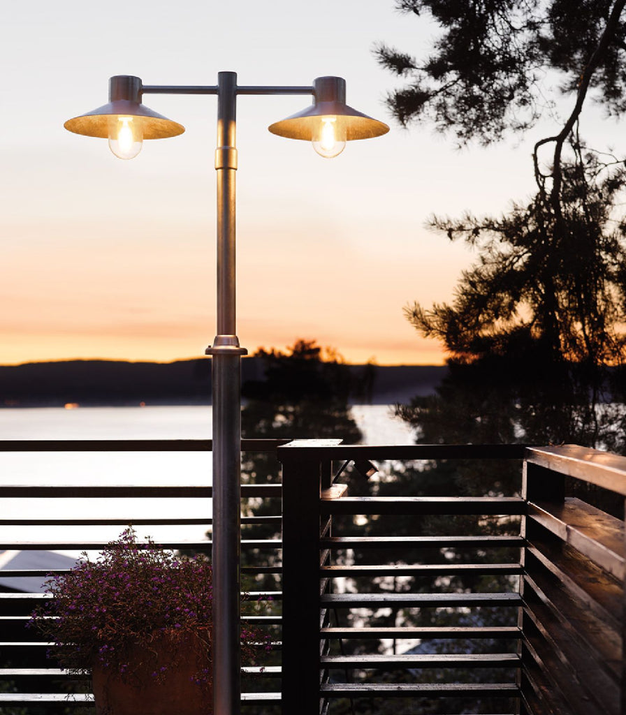 Norlys Lund Pole Light featured within a outdoor space