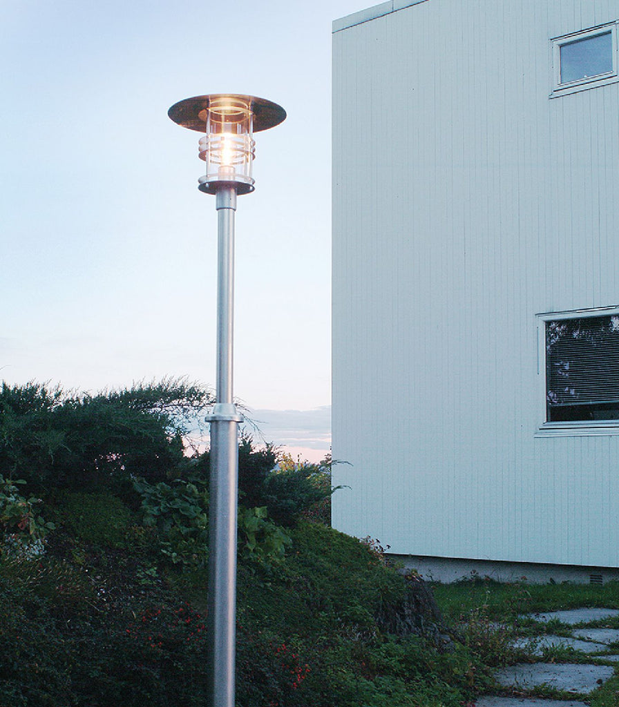 Norlys Stockholm Pole Light featured within a outdoor space