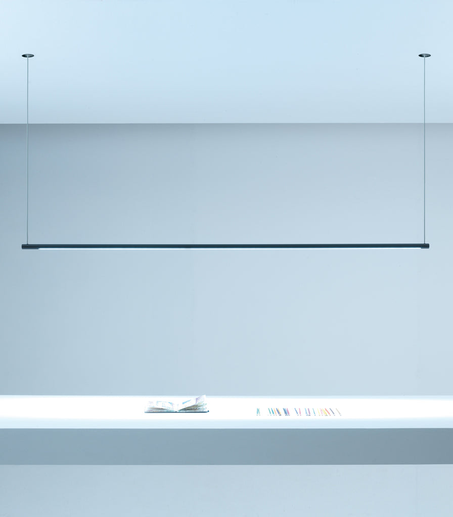 Oty Pop P120/P200 Arc Pendant Light in Small size featured within a interior space