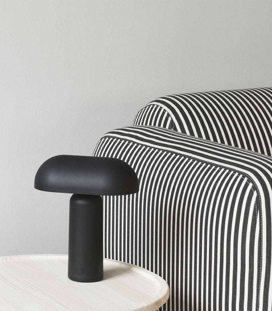 Normann Copenhagen Porta Table Lamp featured within interior space