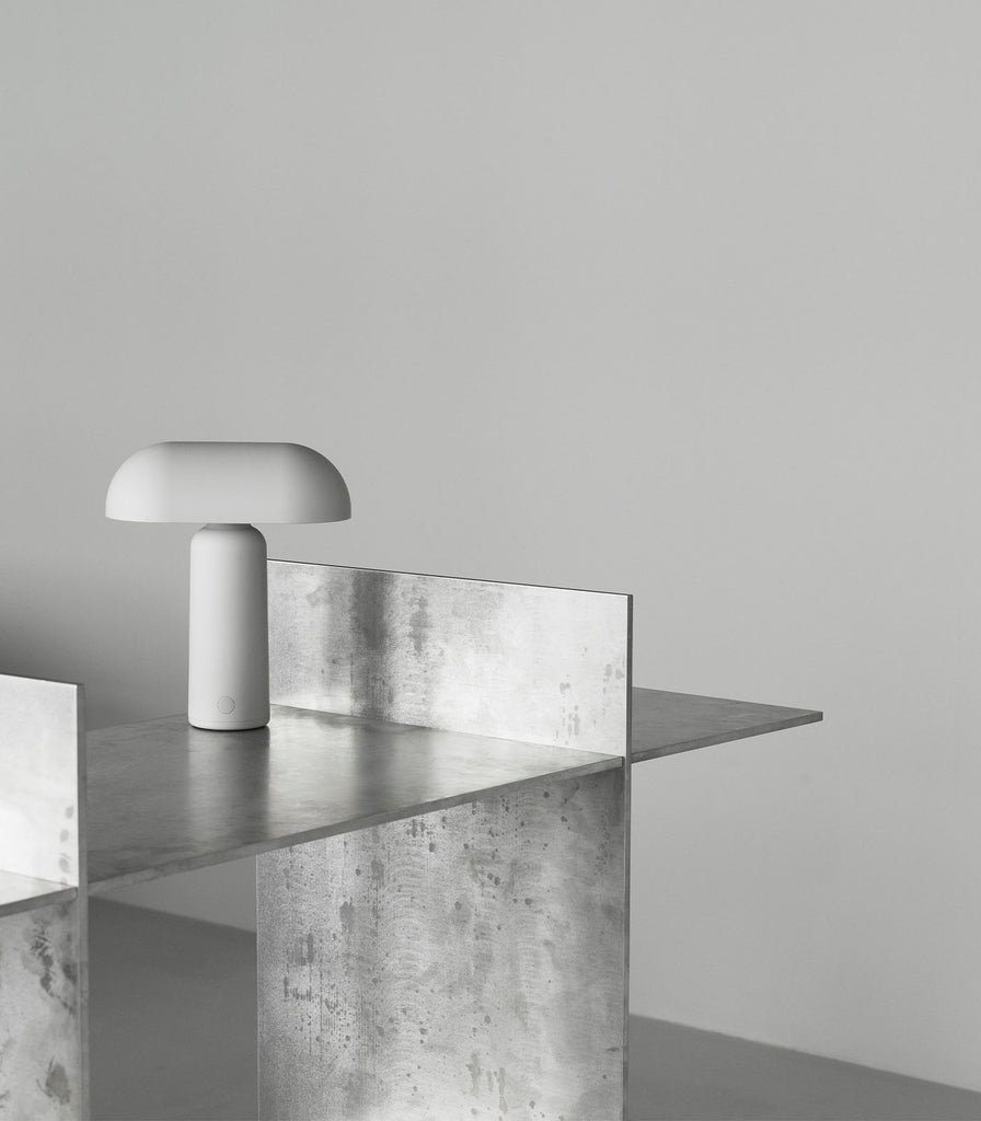 Normann Copenhagen Porta Table Lamp featured within interior space