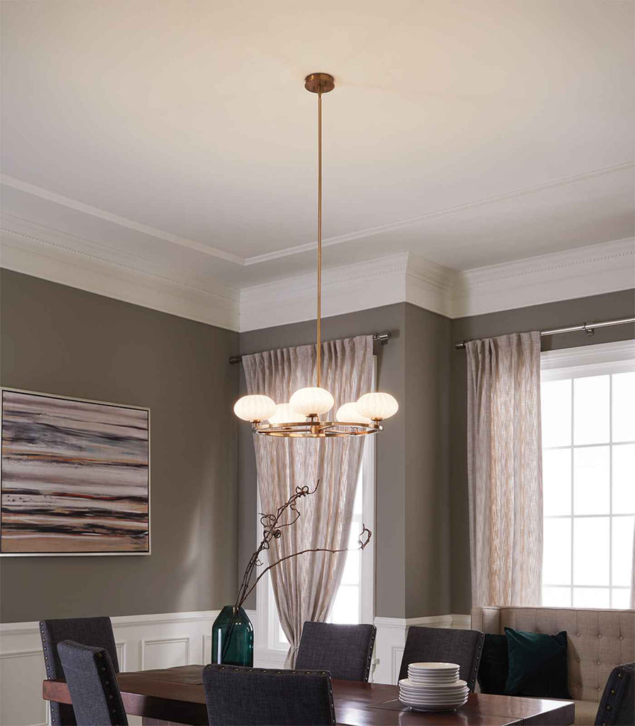 Elstead Pim 5lt Chandelier hanging over dining table