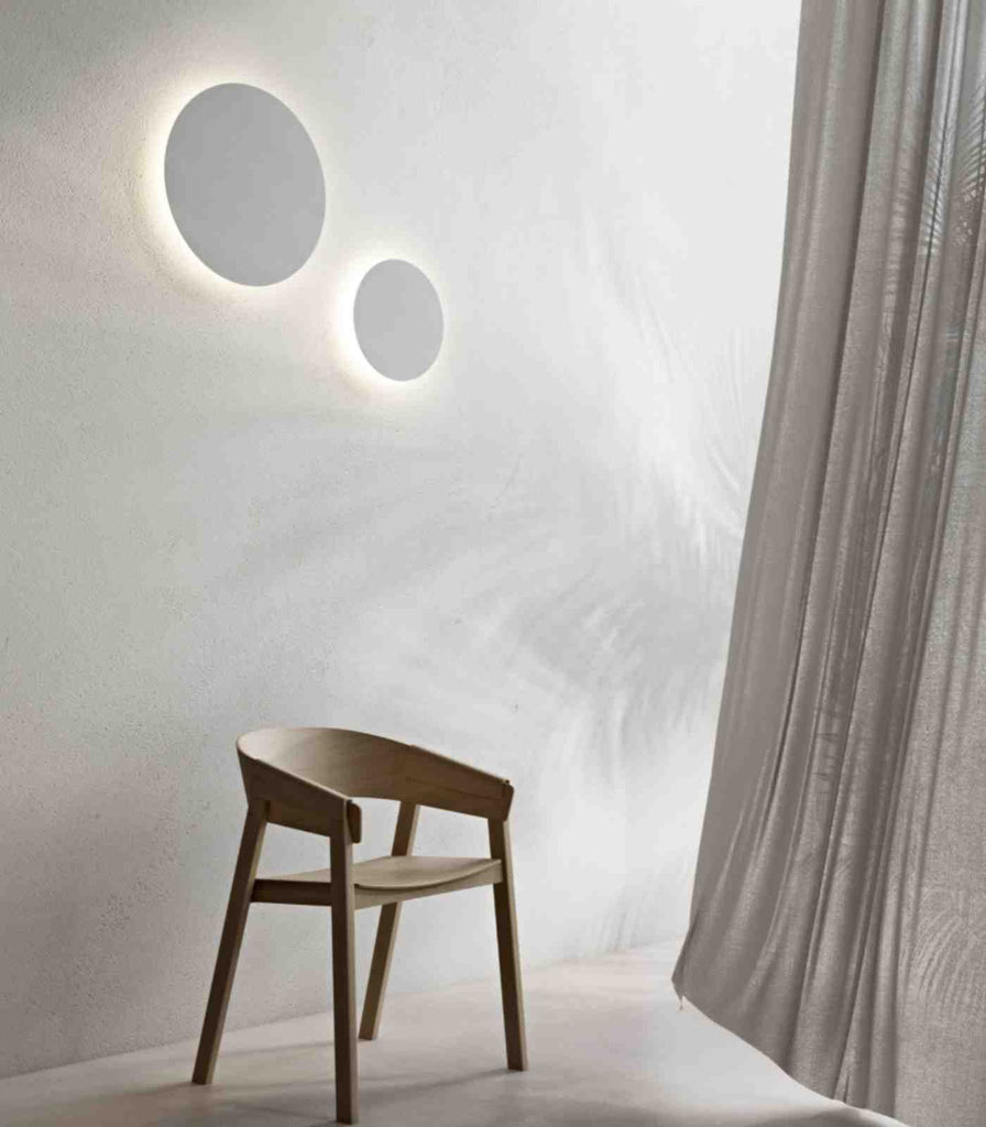 Lighting Republic Shadow Wall Light in medium and large size placed on Wall.
