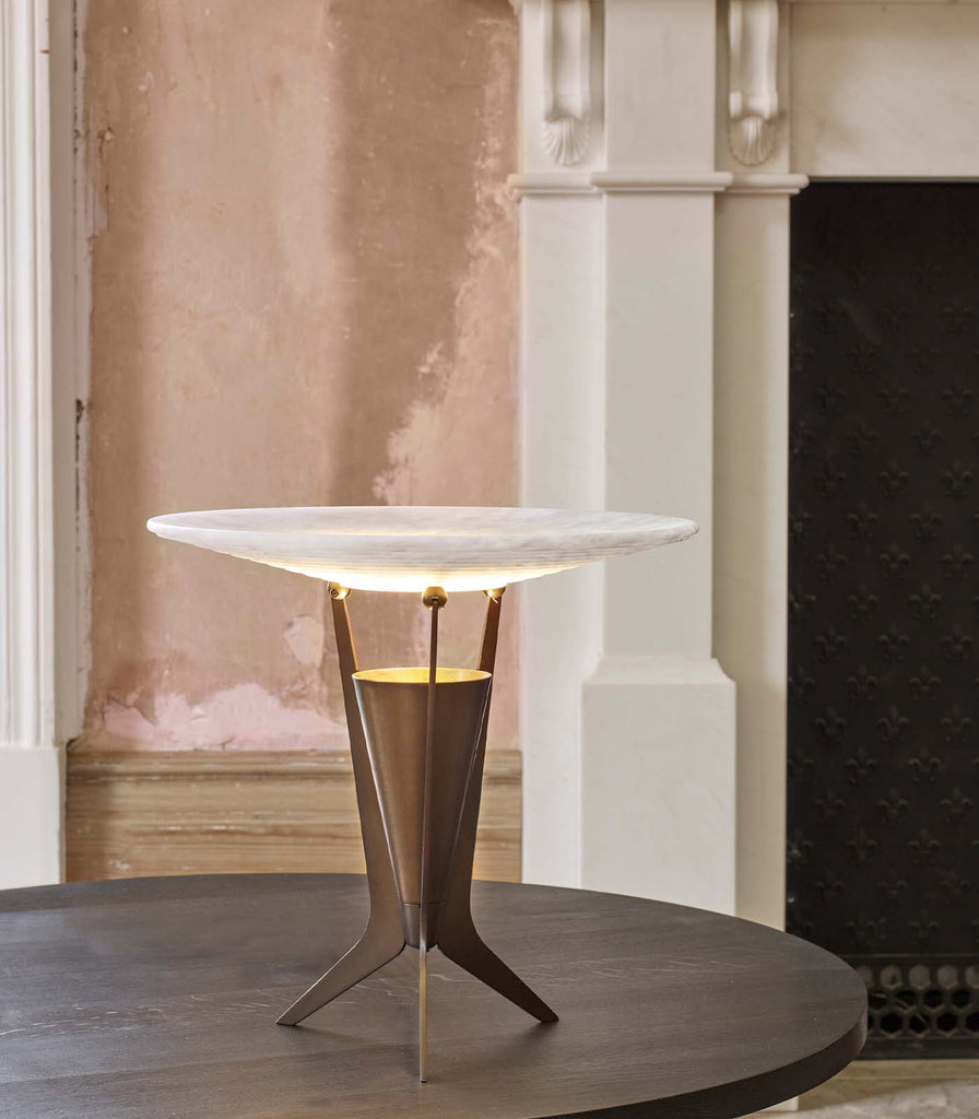 J. Adams & Co. Aragon Table Lamp in Antique Brass/White Alabaster featured in an interior space
