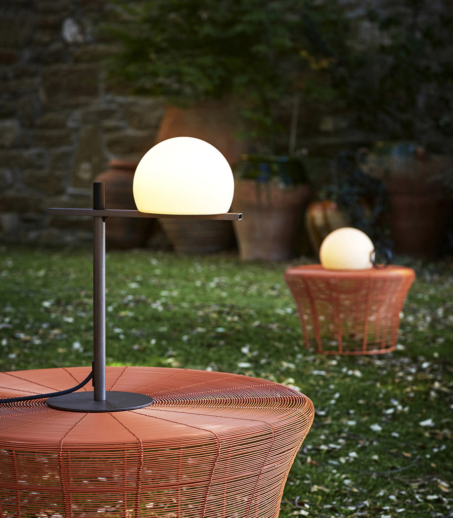 Estiluz Circ Outdoor Table Lamp featured within outdoor space