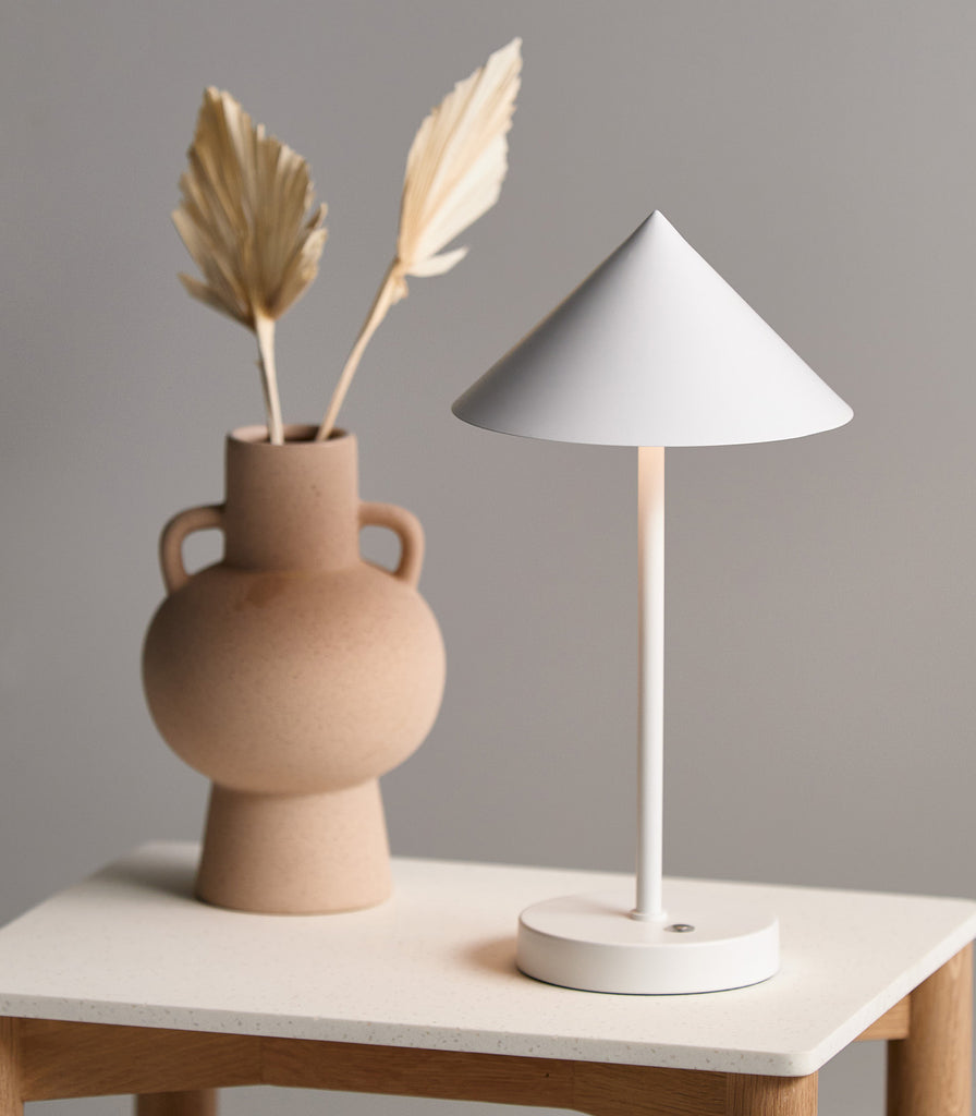 Mayfield Floris Portable Table Lamp featured within interior space