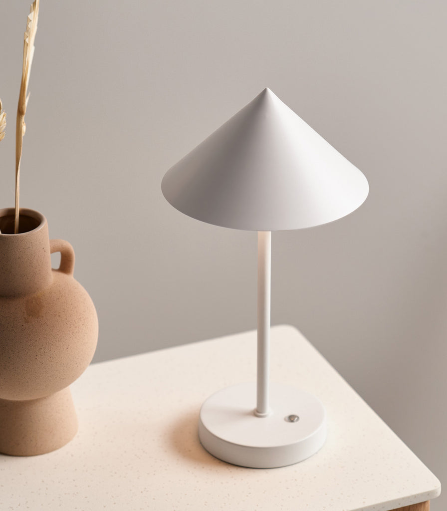 Mayfield Floris Portable Table Lamp featured within interior space