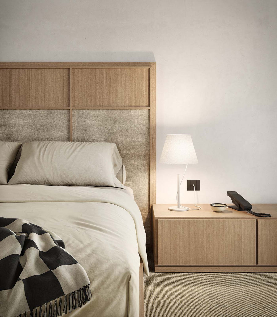 Lodes Hover Table Lamp placed over bedside table