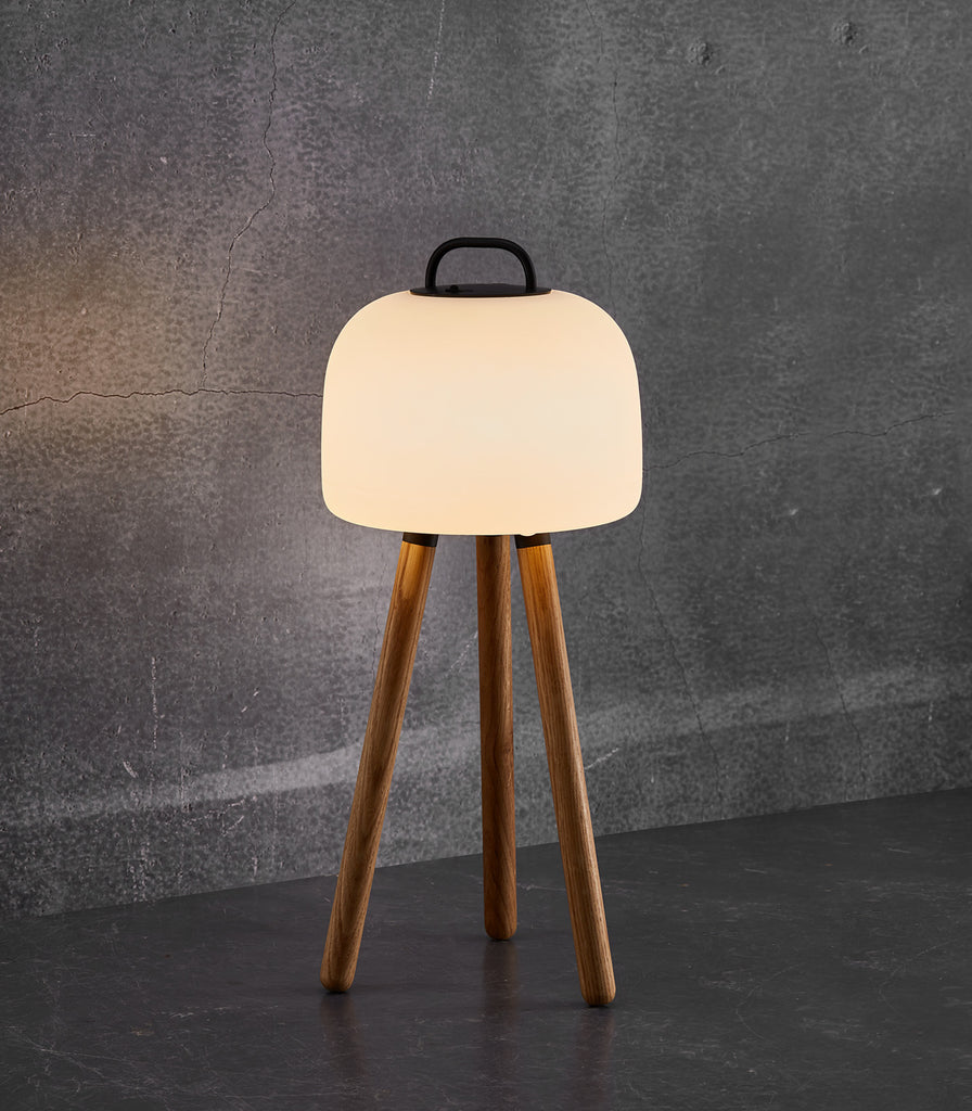 Nordlux  Kettle Tripod Table Lamp featured within outdoor space