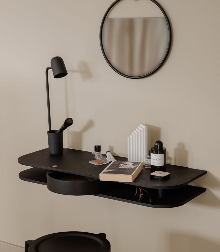 Northern Buddy Table Lamp featured within a interior space