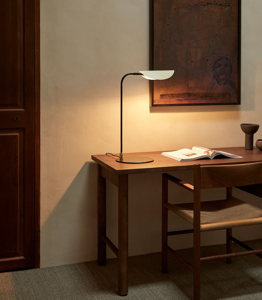 Aromas Ficus Table Lamp placed over table