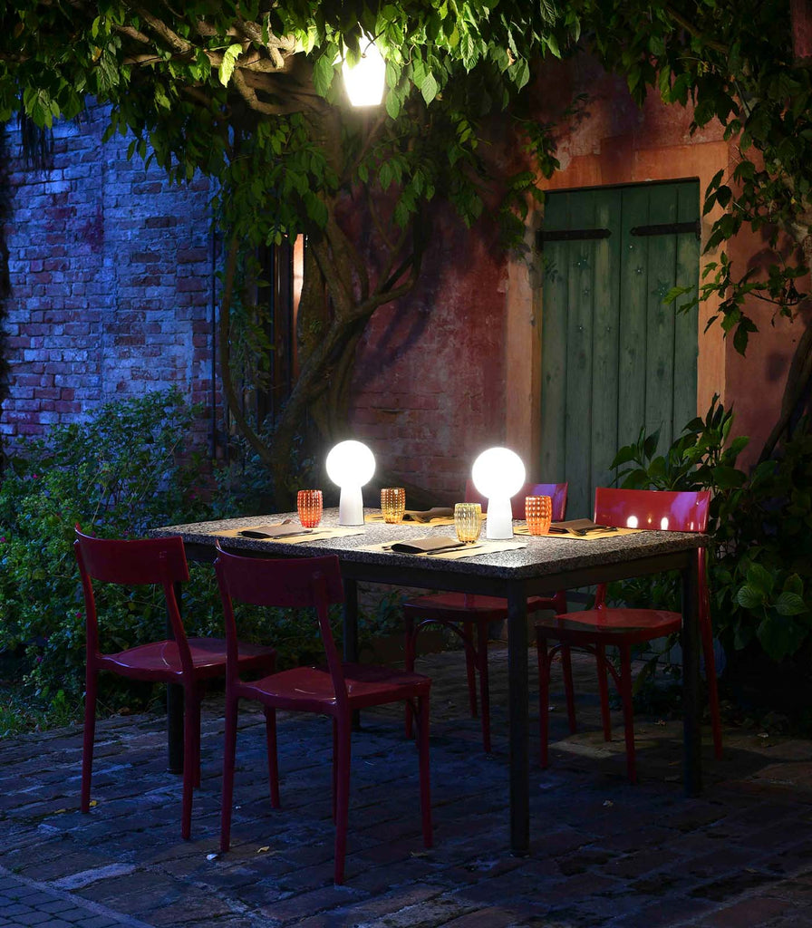 Ai Lati Olimpia Table Lamp placed over dining table