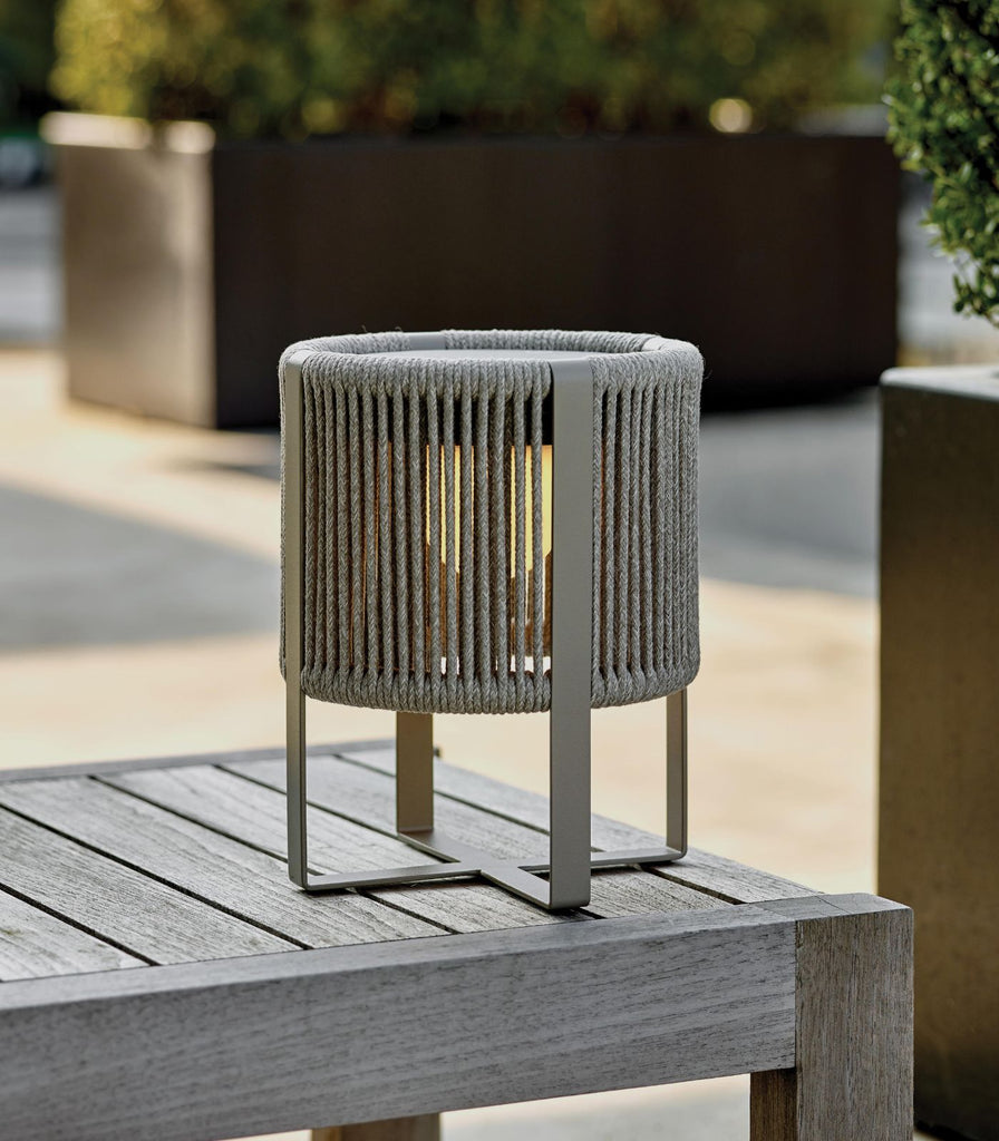 Royal Botania Ropy Table Lamp featured within a outdoor space