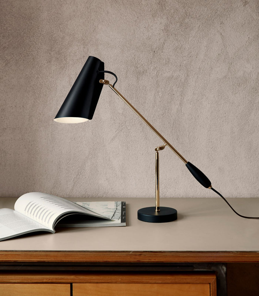 Northern Birdy Table Lamp featured within a interior space