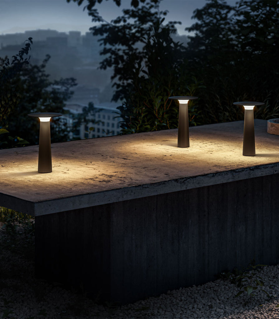 IP44.DE Lix Table Lamp featured within outdoor space