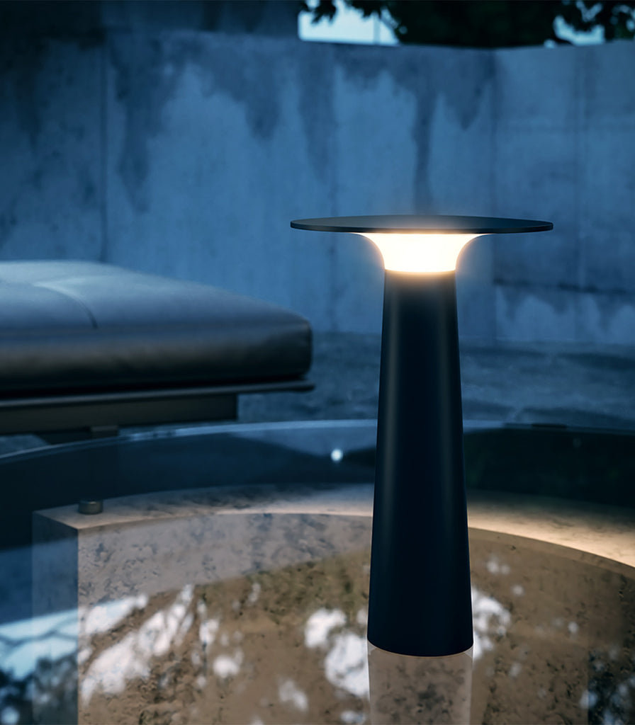 IP44.DE Lix Table Lamp featured within outdoor space