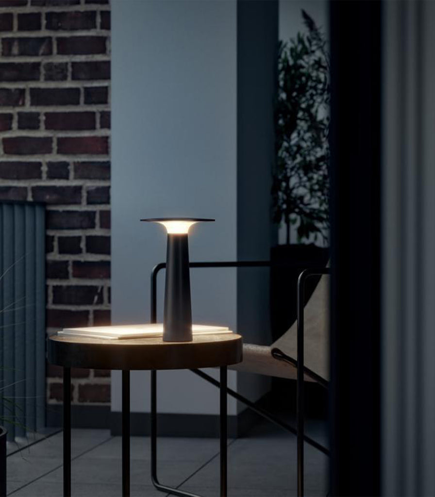 IP44.DE Lix Table Lamp featured within outdoor space